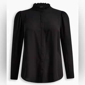 NWOT Torrid Sheet Black Blouse with ruffled neckline.
